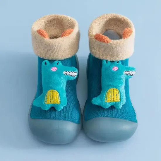 Imagen de Zapatos de bebé tipo calcetín con suela de goma