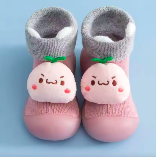 Imagen de Zapatos de bebé tipo calcetín con suela de goma