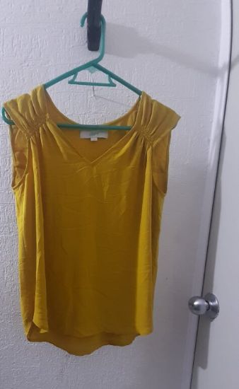 Imagen de Blusa mostaza talla XS